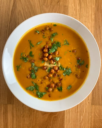 Overhead shot of the plated ginger pumpkin soup