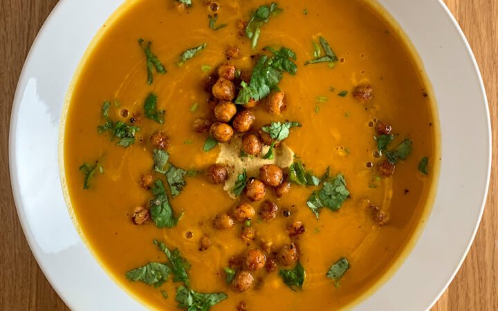 Overhead shot of the plated ginger pumpkin soup