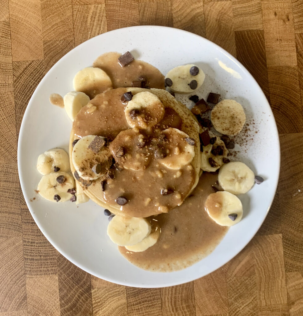 Overhead shot of the Chocolate Peanut Butter Banana Protein Pancakes 